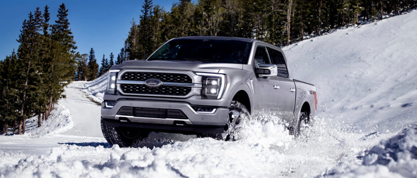 2023 Ford F-150 driving through snow