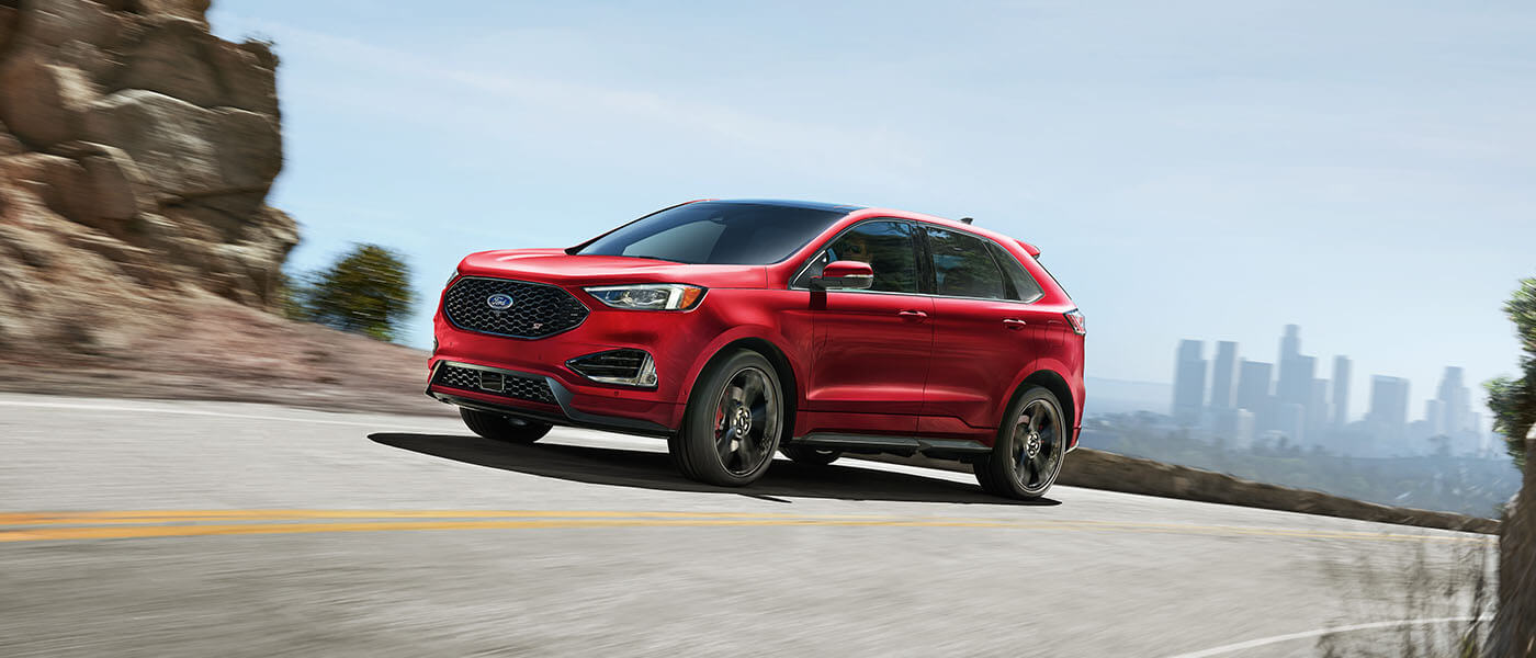 2024 Ford Edge driving on rocky road