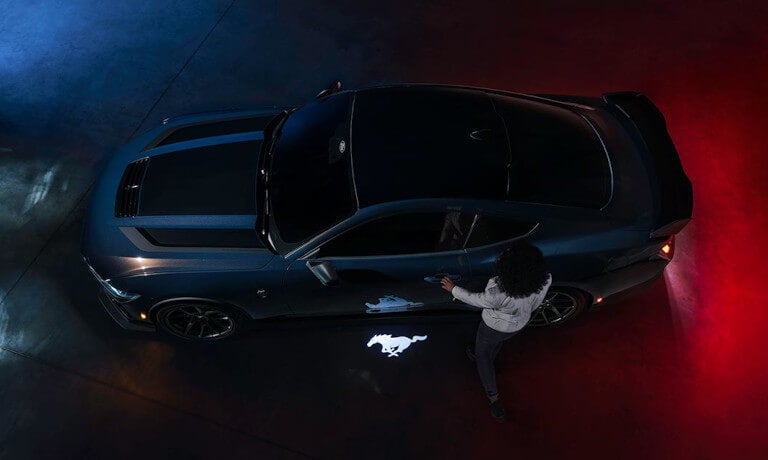 2024 Ford Mustang from above with driver