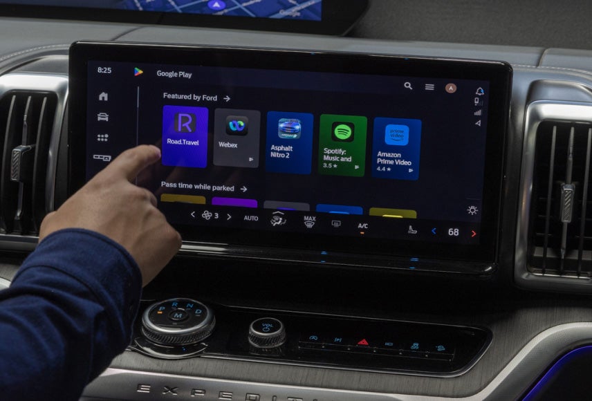 A Ford vehicle technology screen displaying a Webex video conferencing call with others. Screen may vary.