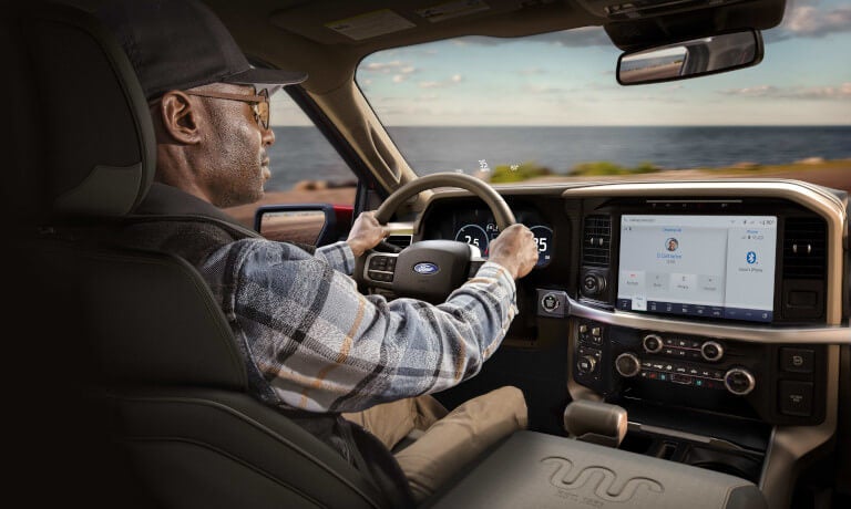 2025 Ford F-150 front with driver