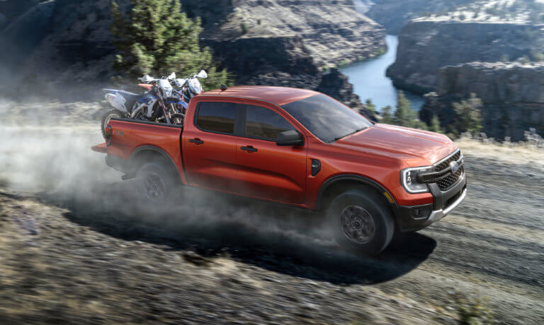 2025 Ford Ranger driving with bikes in the bed