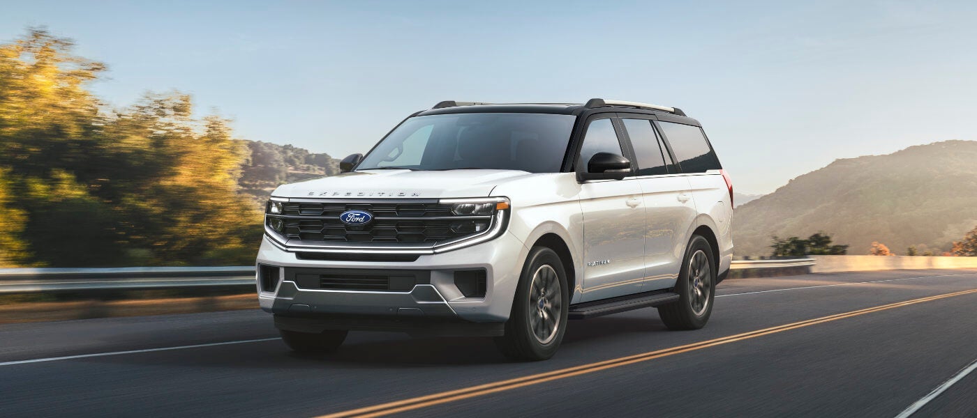 2027 Ford Expedition driving on mountain road