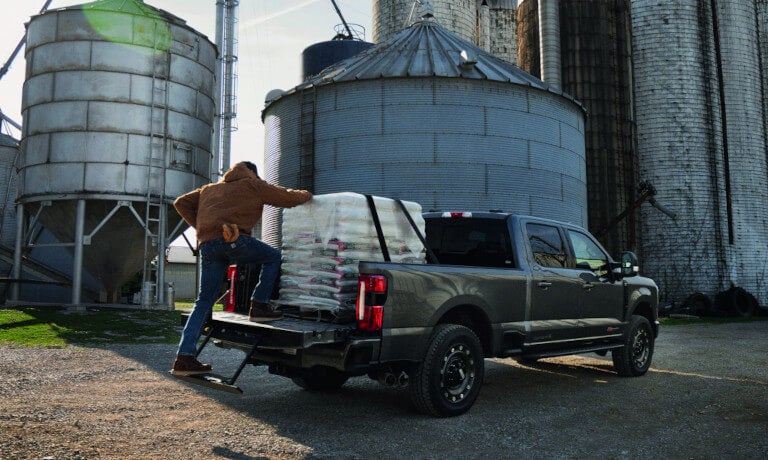 2027 Ford Super Duty with cargo loaded in the bed