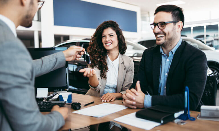 Couple receiving vehicle keys