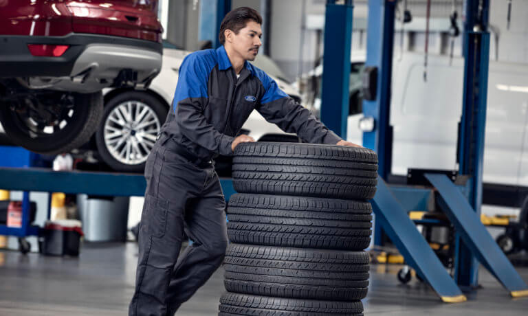 Ford Service Tech Moving Tires